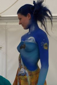 Cute Girl Show Her Blue Body Painting