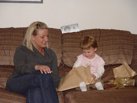 my sister and lainey opening a gift
