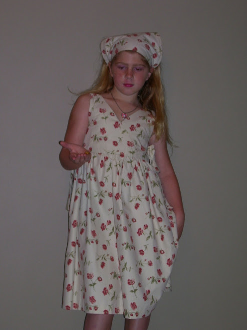 beige and floral sundress with head scarf