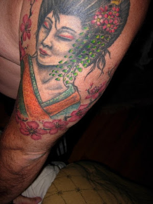 Nice Colors and Shading in this Geisha tattoo