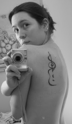 treble clef tattoo,  treble clef tattoos, music tattoo, guitar  tattoos, guitar tattoo designs, guitar tatoo, back shoulder tattoos 