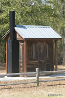 Toilet located west of the parking area. Toilet photo