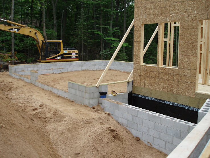 The garage foundation is filled for pouring of the floor.