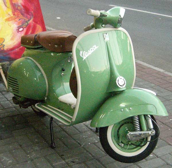 green vespa classic bike