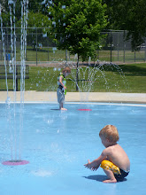 His favorite part the sprinkler...