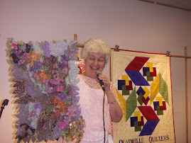 Quadrille Quilters New banner in Background