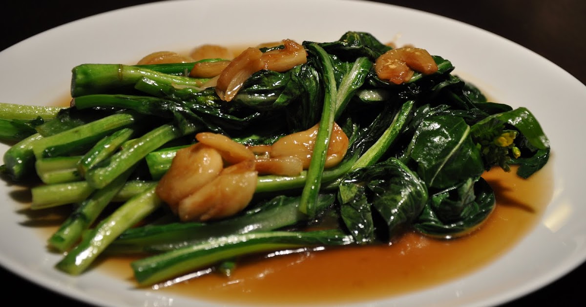Slice of Rice Chinese Spinach with Oyster Sauce and Roasted Garlic