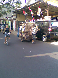 Women's cycling away from the trash