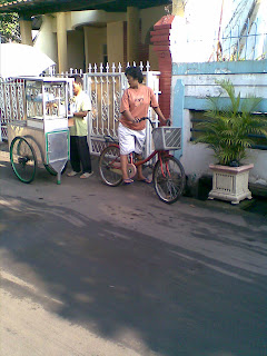 Women with bicycles bought a cake