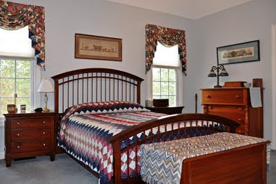 Shaker-style bed with PA Amish quilt
