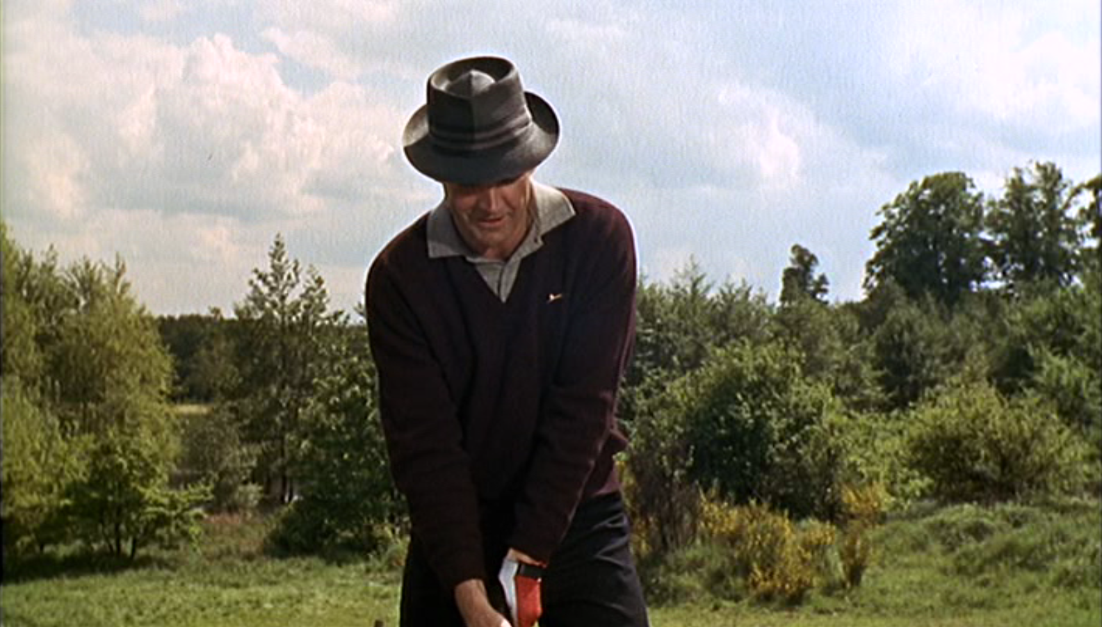 Golf with Goldfinger A Polo and Slazenger Jumper The Suits of James Bond