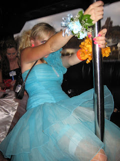 Anna trying out the pole at the back of the limo bus.