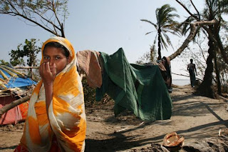 Shurma waiting for her father to bring food from relief distribution. Photo taken on the 7th day after the cyclone. Badurtola, Nishanbari, Barguna. Mahmud/Map/Concern Nov 07