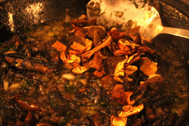 Wild mushrooms and onions fried in plenty of butter, the start of the stuffing for the cabbage