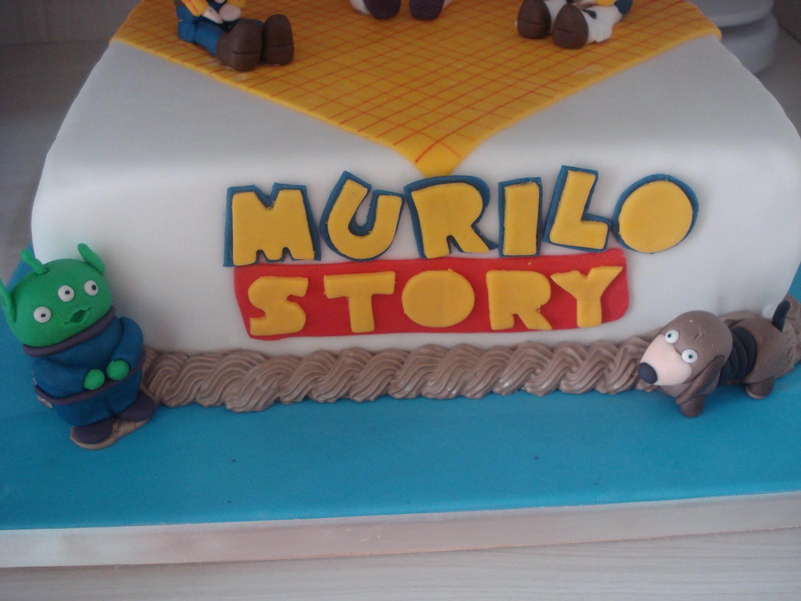 ADELINE TORQUATO DA CUNHA Bolo Toy Story