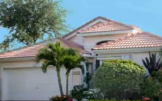 SOLD by Marilyn: Beautiful 3 bedroom, 2 bath home on picturesque lake in CORAL LAKES