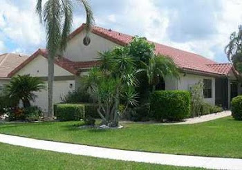 SOLD: Turnkey furnished BOCA WOODS COUNTRY CLUB pool home with lake view