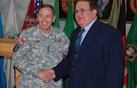Army Gen. David H. Petraeus, commander of U.S. Central Command, shakes hands with Afghan Defense Minister Abdul Rahim Wardak before a meeting with Afghan officials at Defense Ministry headquarters in Kabul, Afghanistan, Nov. 5.