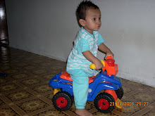 AzFaR NAIK MOTO KECIK