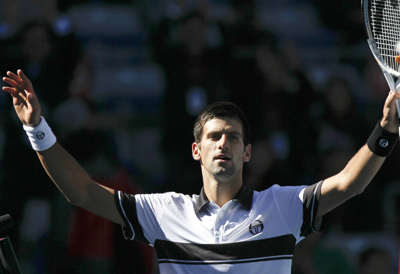 Novak+Djokovic,+final+of+China+Open+in+Beijing+11th+october+2010,+Champion,+defeated+Ferrer+in+straight+sets.+Wearing+black+and+white+sergio+tacchini+6.jpg