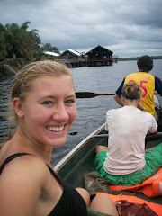 Us on the canoe with Nzulezo behind