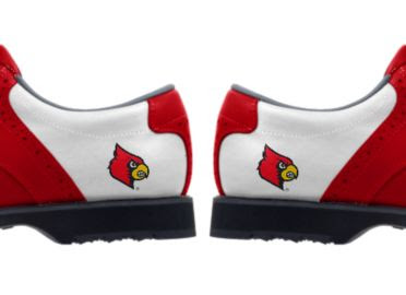 University of Louisville golf shoes with Cardinal Bird school logo on the heels of women's size 8 shoes that are white with red trim and black bottoms.