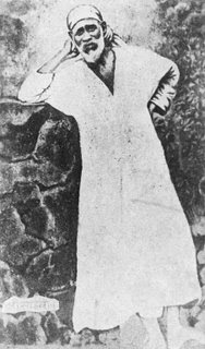 standing sai baba