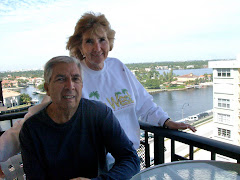 Eddy and Suzanne on the deck of their Condo.  ICW in background-look to the right and see the Ocean