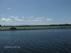 The highway parallels Lake Mitchell