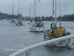 Parade of boats at the Little Ccurrent Swing Bridge