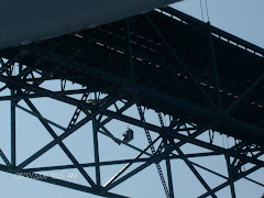 He's waving at me while painting the Mackinaw Island Bridge.  YIKES!