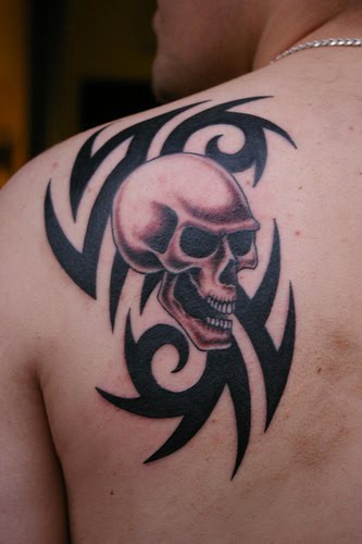 Tribal Skull Tattoo Designs For Man