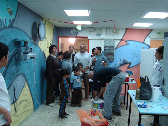 Happy parents in a shelter in Sderot