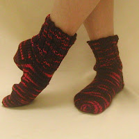 These purple and pink house socks could be yours...only a click away.