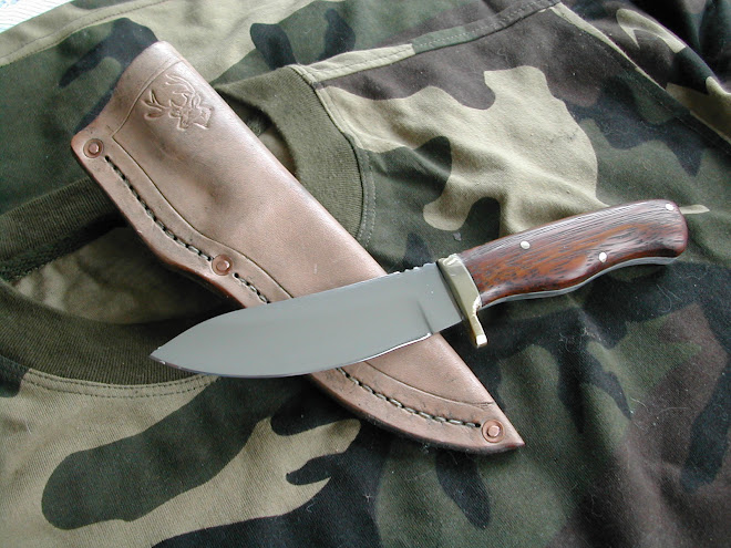 Kwilla handled drop point hunter in D-2 steel