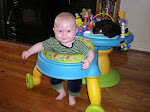 This kid is already zipping around in this walker!