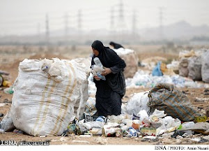Arab Ahwazi lady looking for food in dumping site