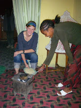 Sarah gets buna lessons from Genet