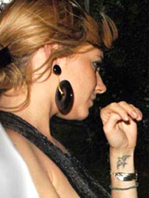 sienna miller dove tattoo pictures