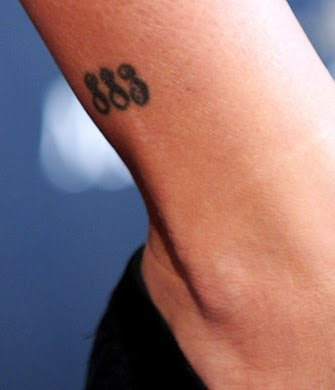 Penelope Cruz wrist and number tattoo design