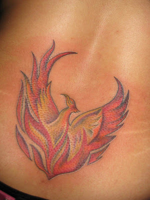 This cool Flame Phoenix Tattoo on the lower back is fabulous!