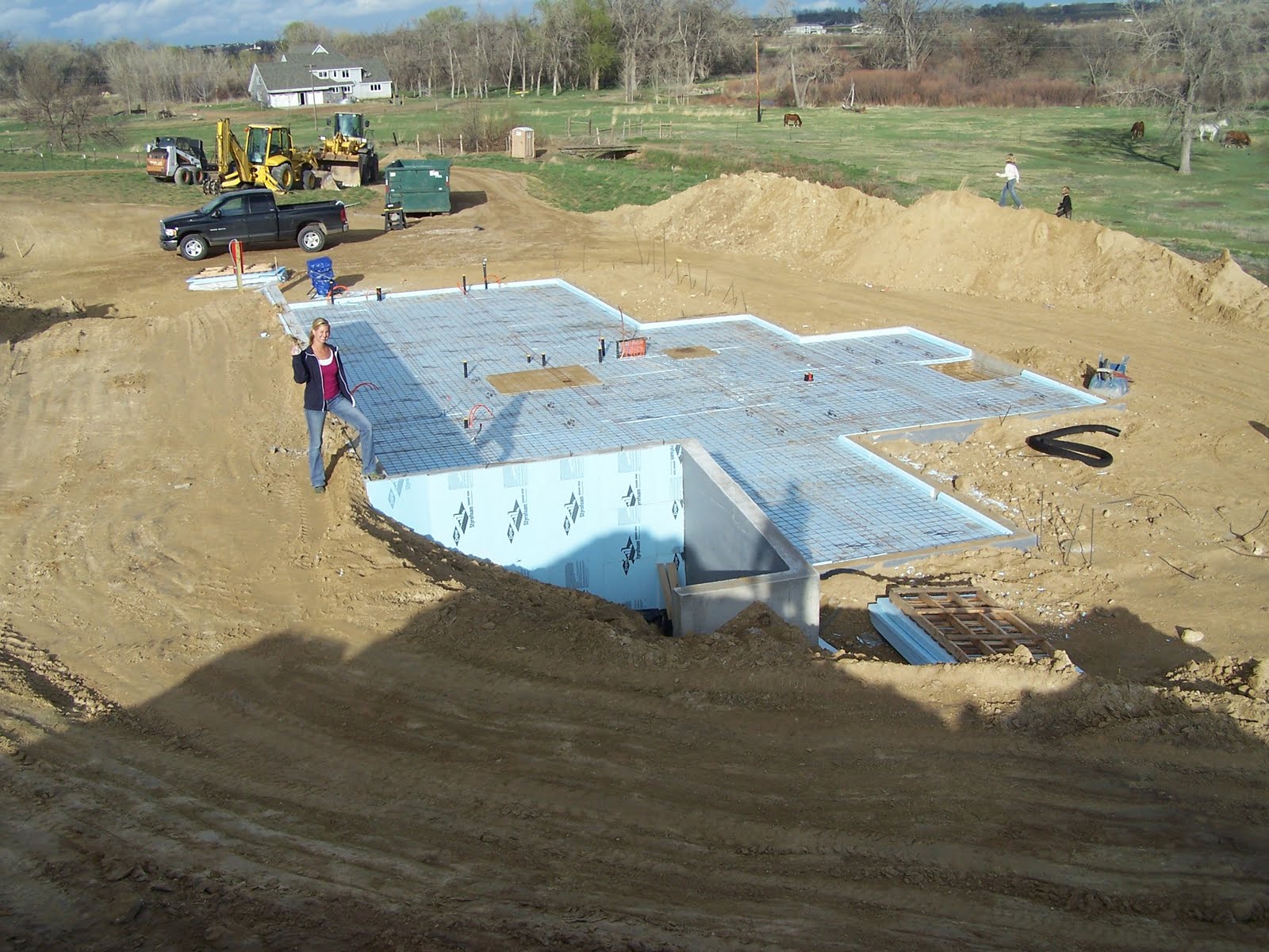 Home Construction Underslab insulation, radiant heat, and rain!