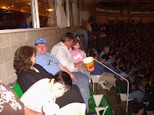 Sharing popcorn with grandpa at the Jazz game!