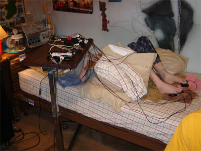 Image of a complex bespoke accessible controller set-up for the Playstation 3.