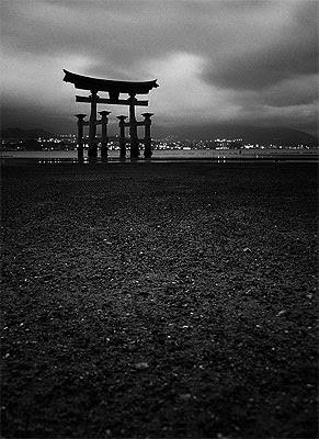 Black and White photo of Torii Gate of Itsukushima Jinjia (Itsukushima Shrine) located on Itsukushima Island (popularly known as Miyajima) in Japan - Pawel Maciejewski