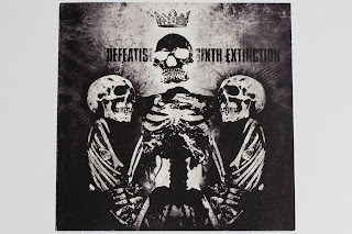 00-defeatist-sixth_extinction-2010-front.jpg