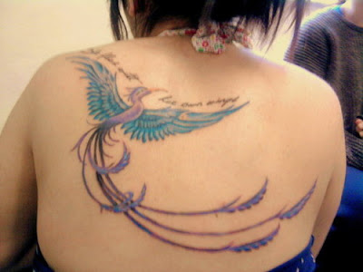 Phoenix tattoo design'She flies with her own wings'