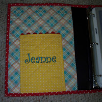 inside of notebook showing pocket with my name embroidered on it