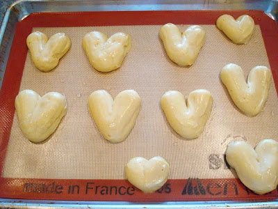 top view of uncooked heart-shaped pastry dough