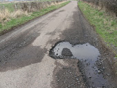 Our roads are full of holes.Click the picture for more info.